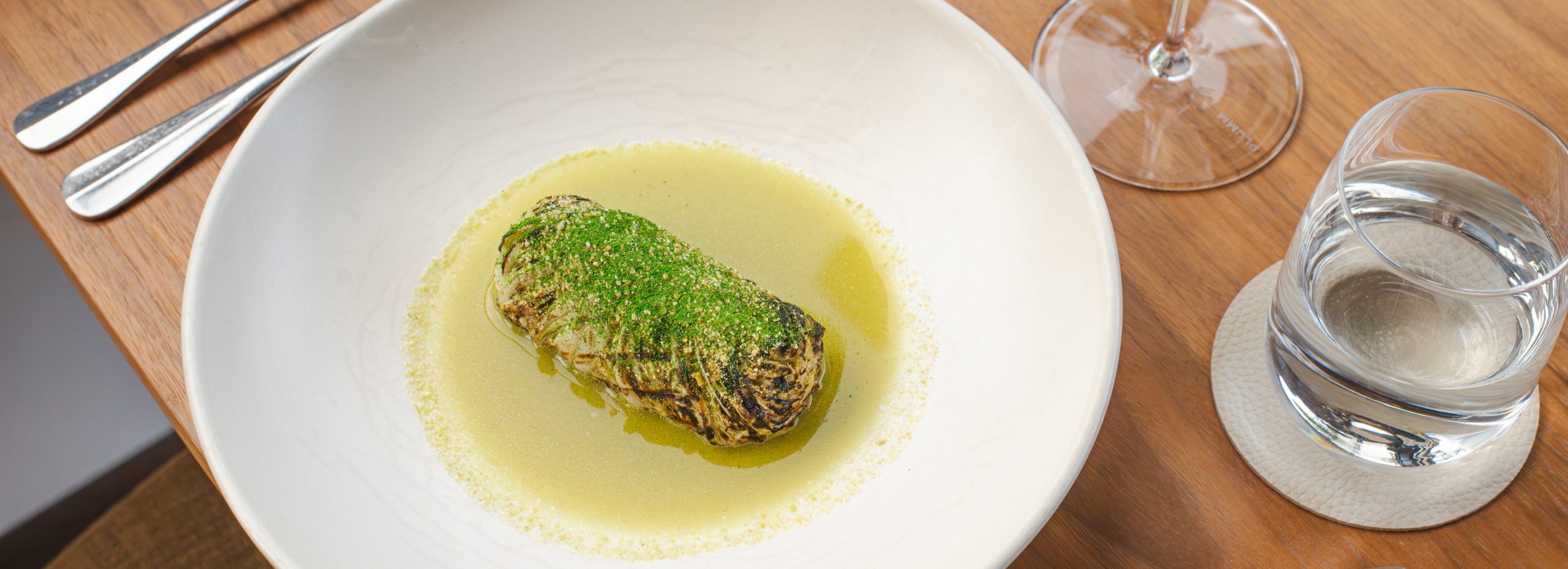Chicken & Shiitake Mousse Wombok Parcel in Nahm Jim Broth
